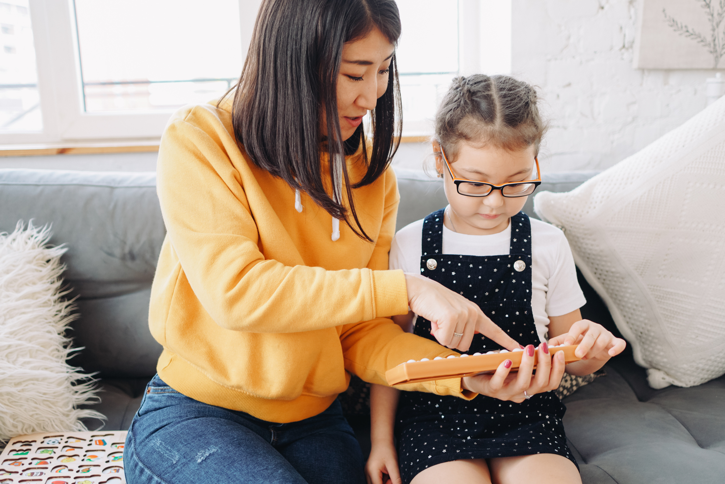 Kid Learning Math from Mother 